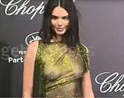 Kendall Jenner braless in a see thru dress videos