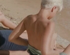Mena Suvari shows her boobs on the beach videos
