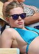 Scarlett Johansson sunbathes in sky bikini pics