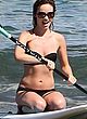 Olivia Wilde surfing in black bikini pics