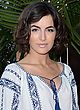 Camilla Belle cleavy & leggy in folk outfit pics