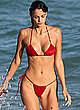 Sofia Resing in red bikini on a beach pics