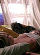 Mircea Monroe lying in bed and showing boobs pics