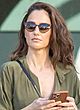 Minka Kelly shows cleavage in a jumpsuit  pics