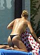 Anna Kournikova sunbathing topless with bf pics