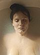 Ana Girardot showing breasts in bathtub pics