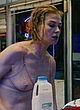 Rosamund Pike undressing, nude tits in store pics