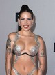 Halsey shows bust in daring outfit pics