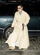 Gigi Hadid elegant in warm tan coat pics