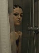 Riley Keough flashes small tits in shower pics