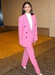 Nina Dobrev rocks a stylish pink suit pics