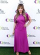 Alyssa Milano posing in purple dress pics