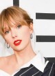 Taylor Swift wows in asymmetrical dress pics