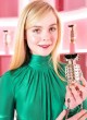 Elle Fanning steps out in emerald dress pics