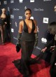 Janelle Monae in plunging black gown pics