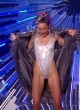 Miley Cyrus erotic in silver bodysuit pics