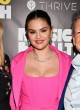 Selena Gomez stuns in pink, shows cleavage pics
