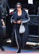 Kim Kardashian out in adidas outfit and heels pics
