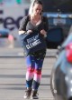 Jennifer Love Hewitt in leggings and gray top pics