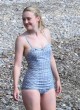 Dakota Fanning wows in vintage blue swimsuit pics