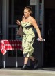 Hilary Duff out and about in green dress pics