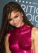 Zendaya posing in sexy pink outfit pics