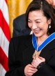 Michelle Yeoh receives a medal pics