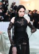 Billie Eilish posing in gothic sheer dress pics