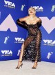 Miley Cyrus posing in sheer elegant dress pics