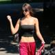 Emily Ratajkowski Emily Ratajkowski Stuns in Strapless Top and Track Pants pics