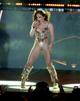 Jennifer Lopez Jennifer Lopez Dazzles in Glittering Bodysuit and Boots! pics