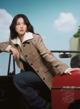 Jisoo Defines Jisoo's Retro Ride: Preppy Perfection for Vogue Japan! pics
