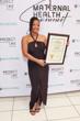 Uncategorized Halle Bailey Radiates Elegance at Maternal Health Summit pics