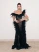 Millie Bobby Millie Bobby Brown Dazzles in Dramatic Feathered Gown! pics