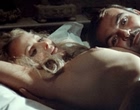 Ursula Andress shows boobs and butt in bed videos