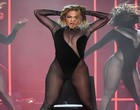 Jennifer Lopez performing in sheer catsuit videos